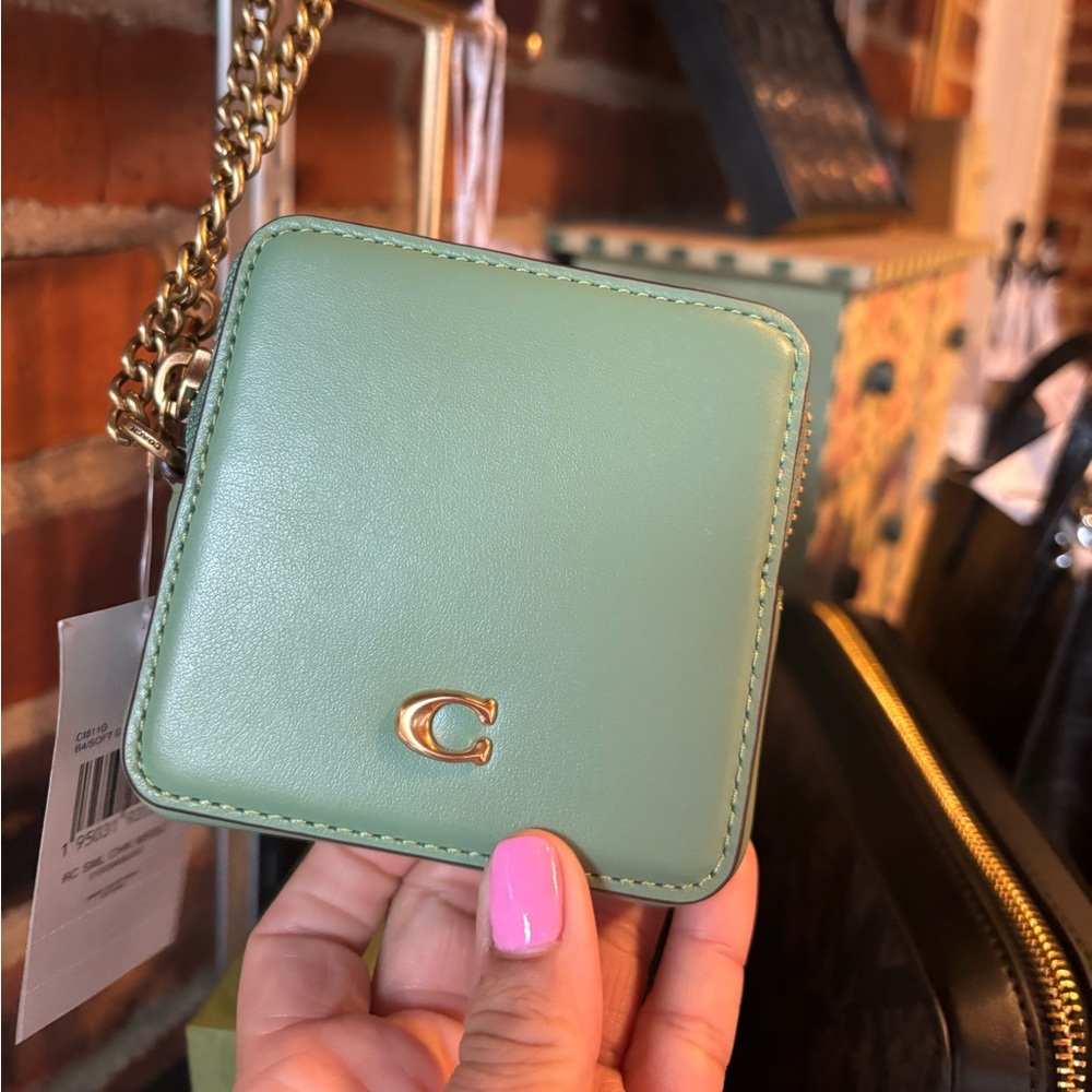 Beautiful Coach key wallet bag . Mint green